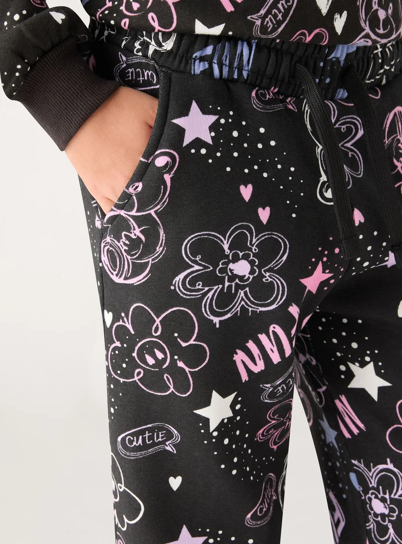 Pantaloni tuta lunghi con stampa graffiti