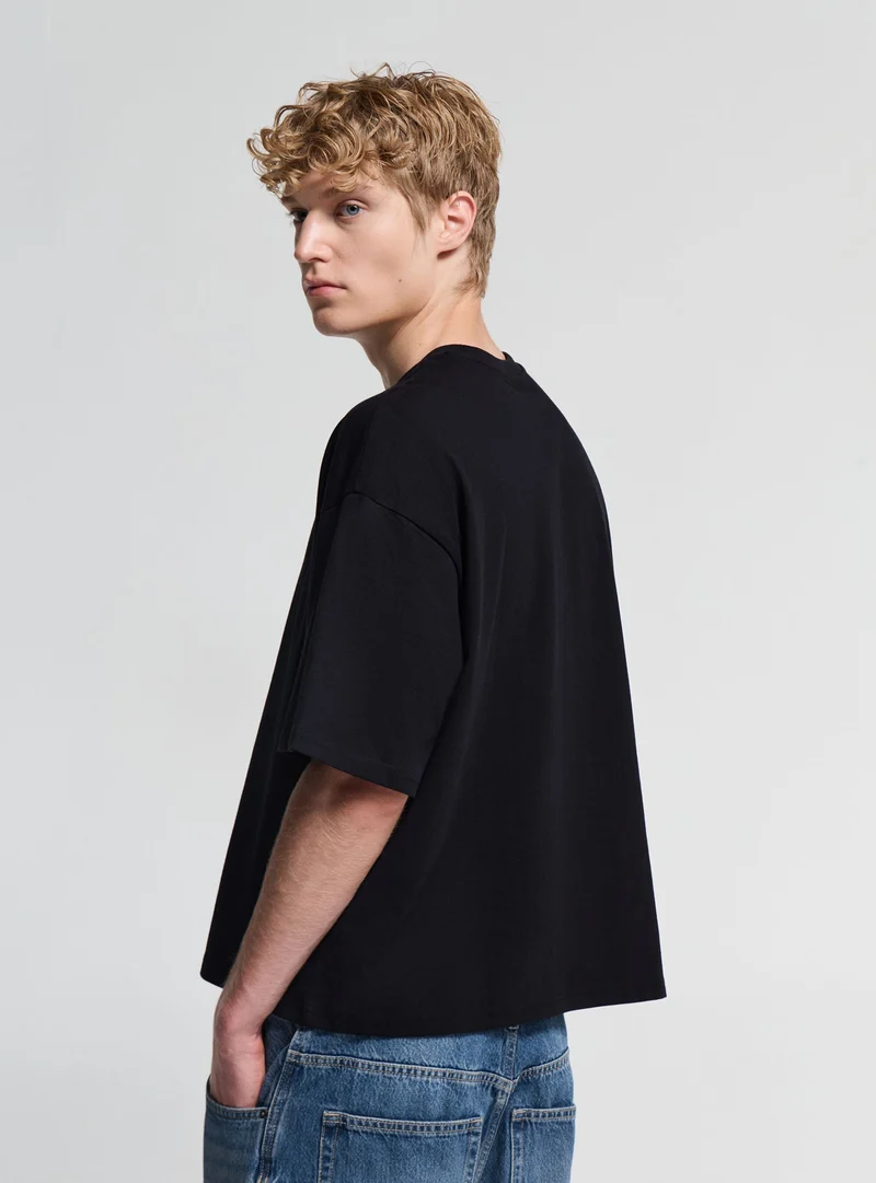T-shirt crop a tinta unita