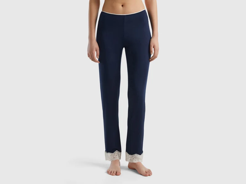 Pantaloni con dettagli in pizzo
