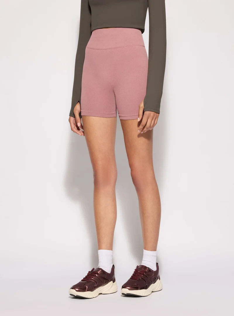 Leggings sportivi corti seamless con arriccio