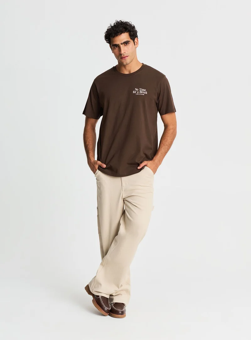 T-shirt con stampa e scritta