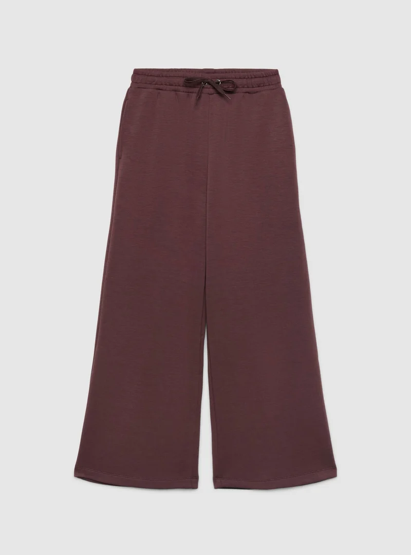 Pantaloni tuta maxi a tinta unita con coulisse