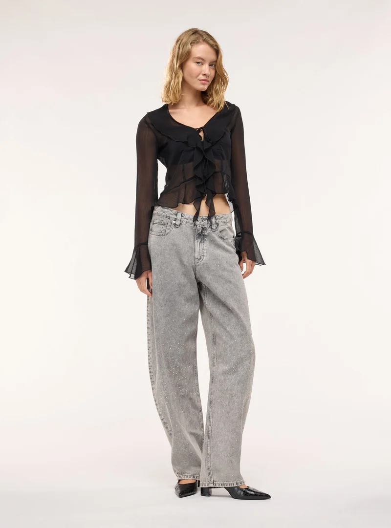 Jeans balloon con applicazioni strass