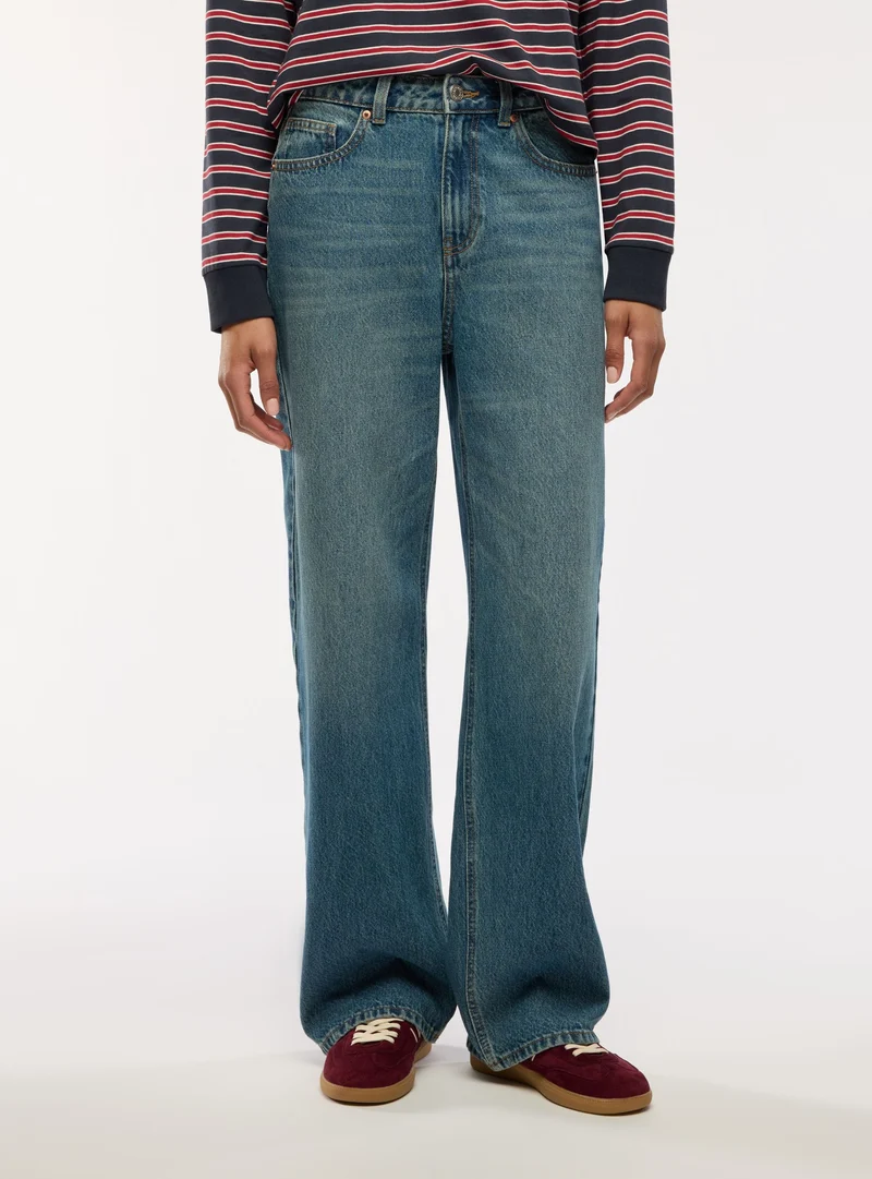 Jeans wide leg a tinta unita