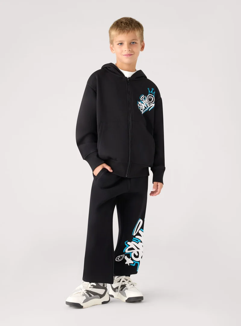 Pantaloni tuta lunghi con stampa graffiti