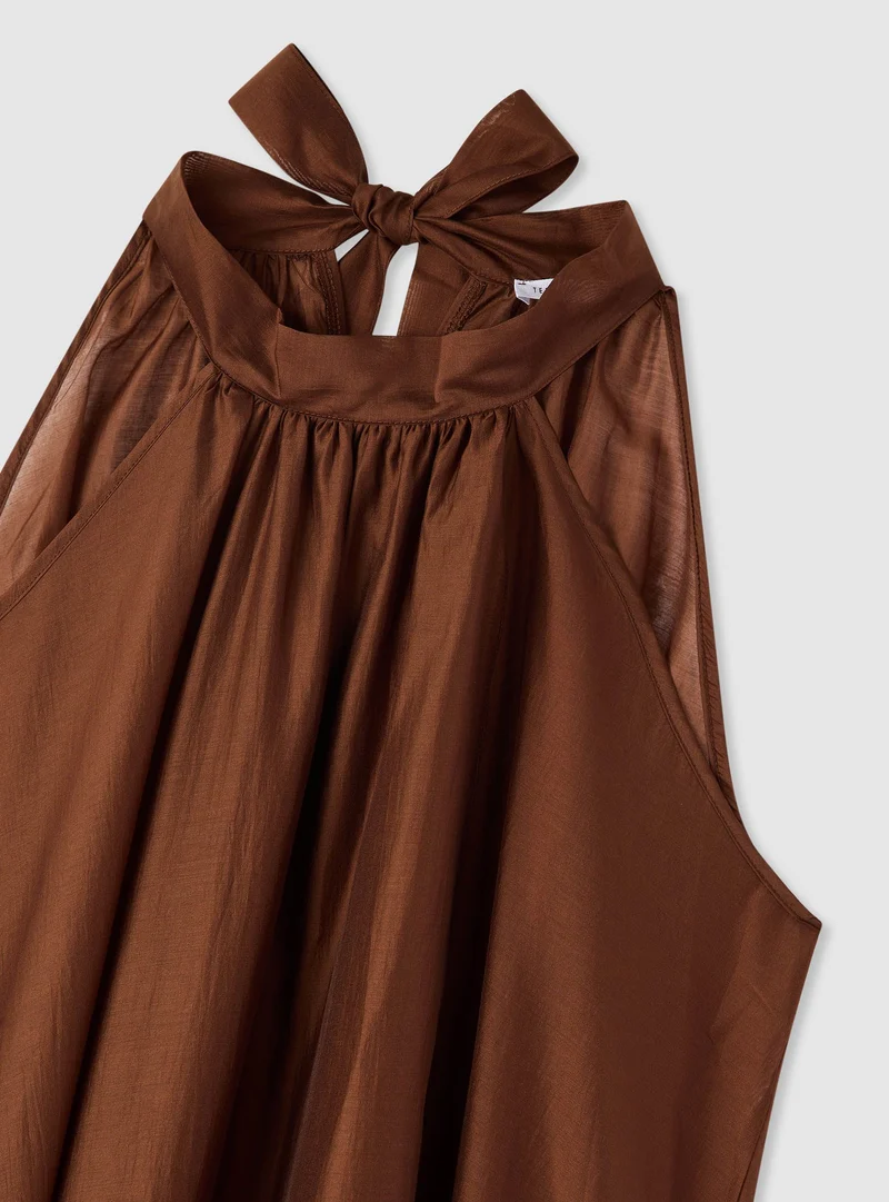 Vestito lungo con scollo all’americana e fiocco