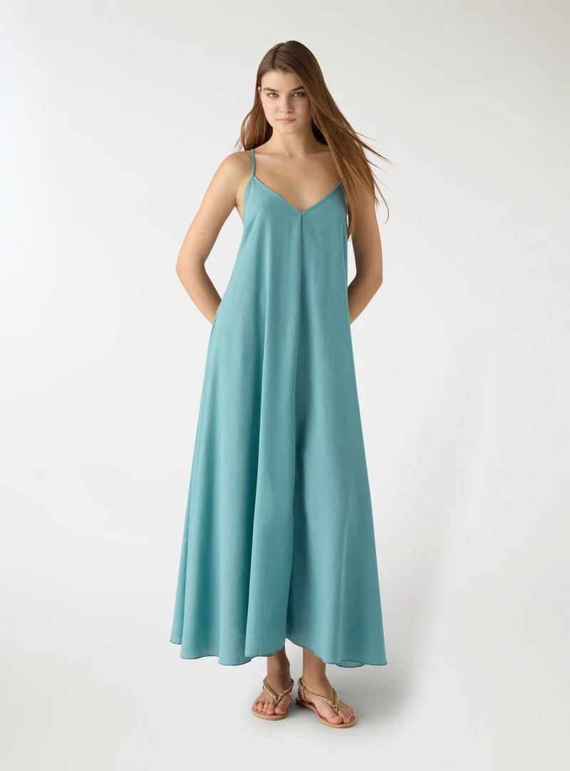 Vestito lungo a tinta unita con spalline incrociate