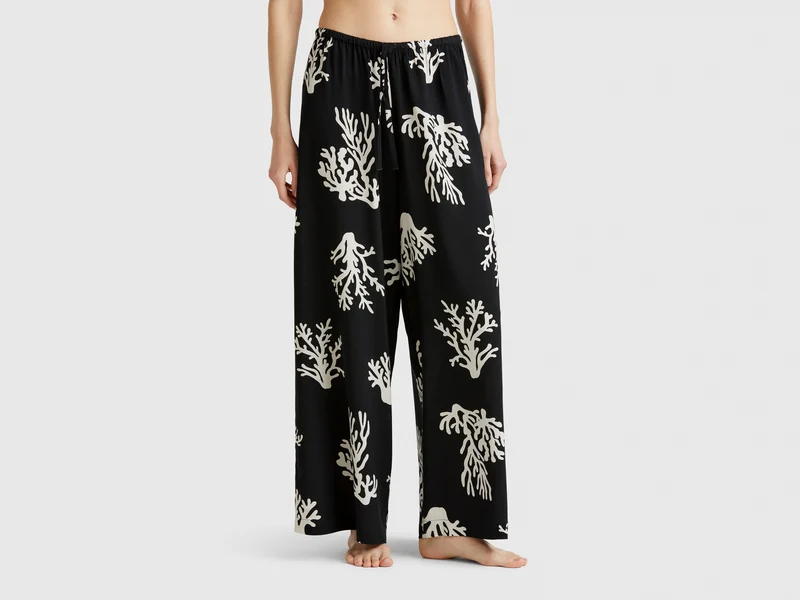 Pantaloni con stampa coralli
