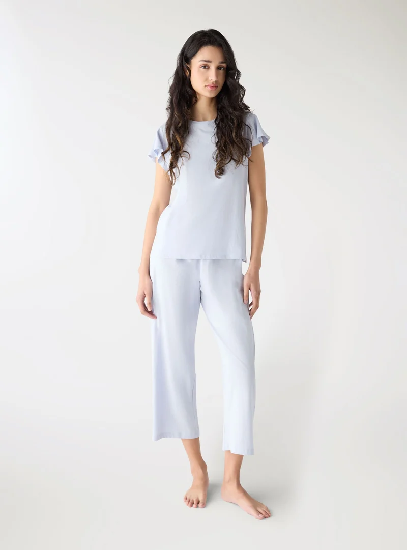 Set pigiama t-shirt e pantaloni capri
