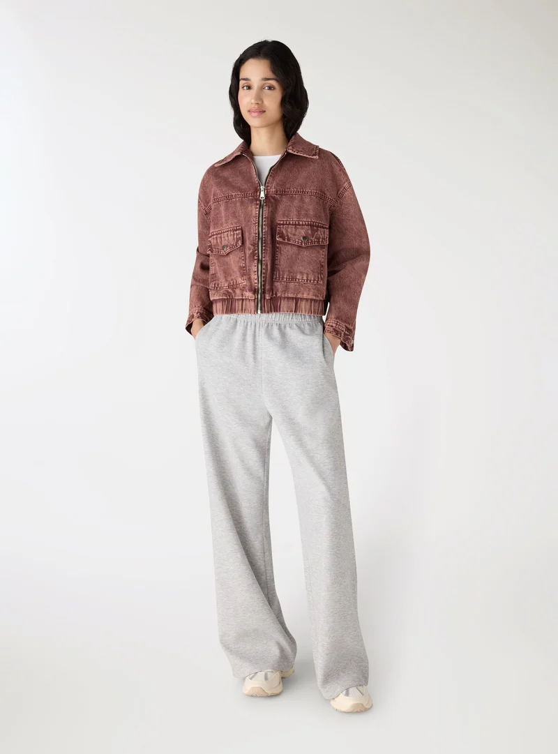 Bomber in denim con zip e tasche