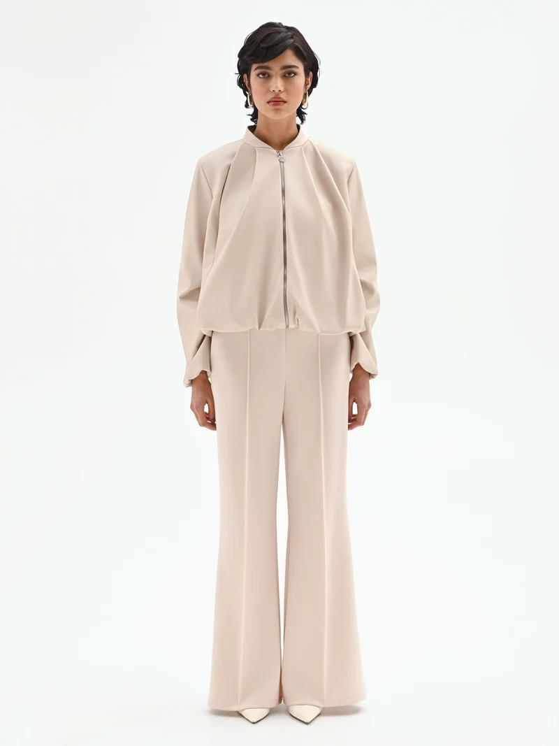 Bomber in similpelle tortora beige con maniche a palloncino