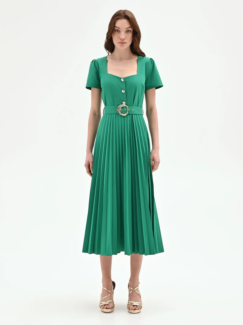 Abito midi verde con gonna plissé