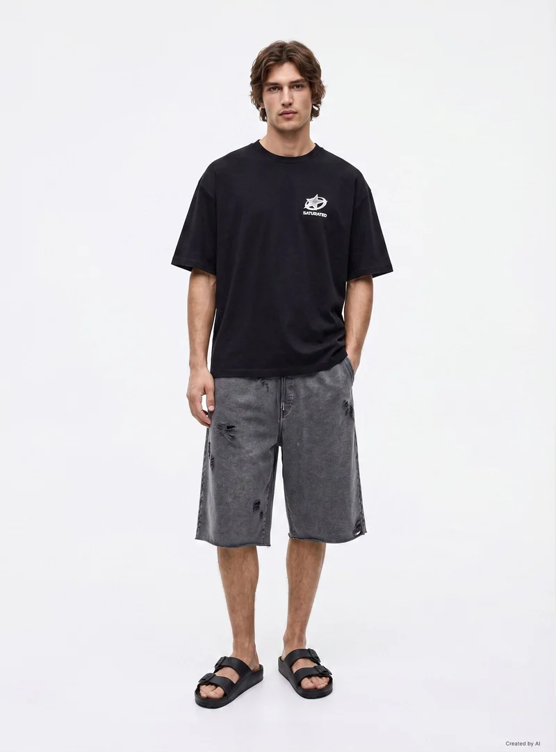 T-shirt over con stampa stella