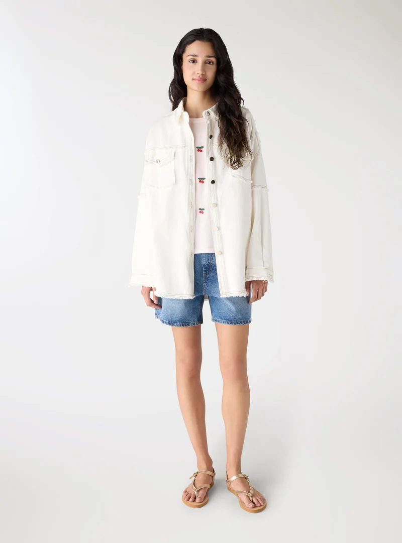 Shacket in denim con tasconi
