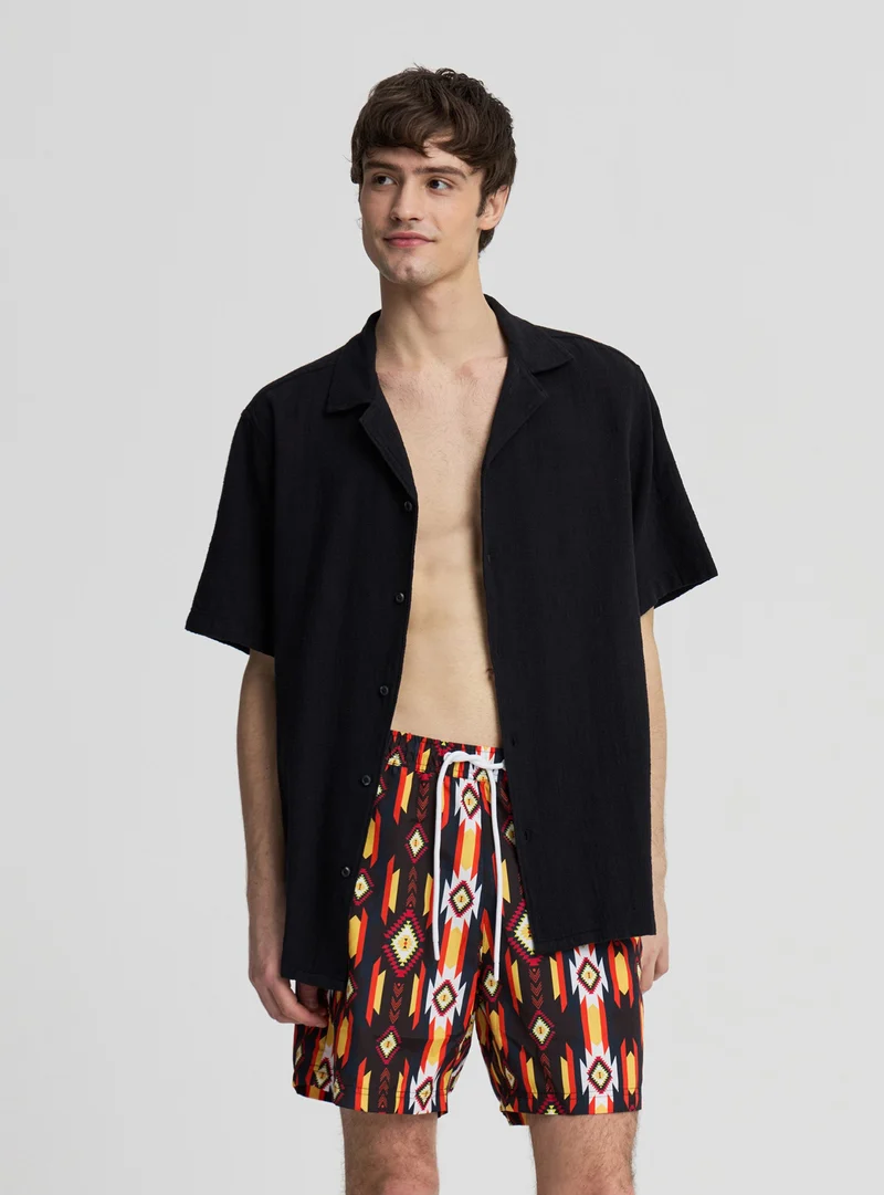 Costume bermuda con stampa etnica