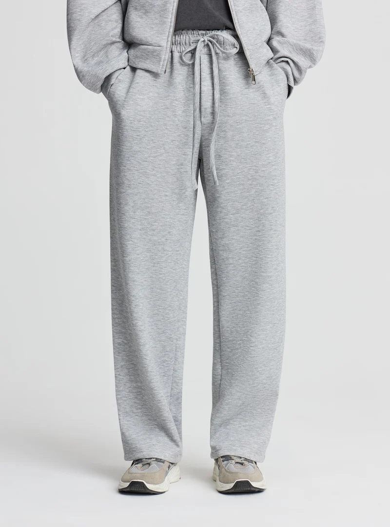 Pantaloni tuta relaxed a tinta unita