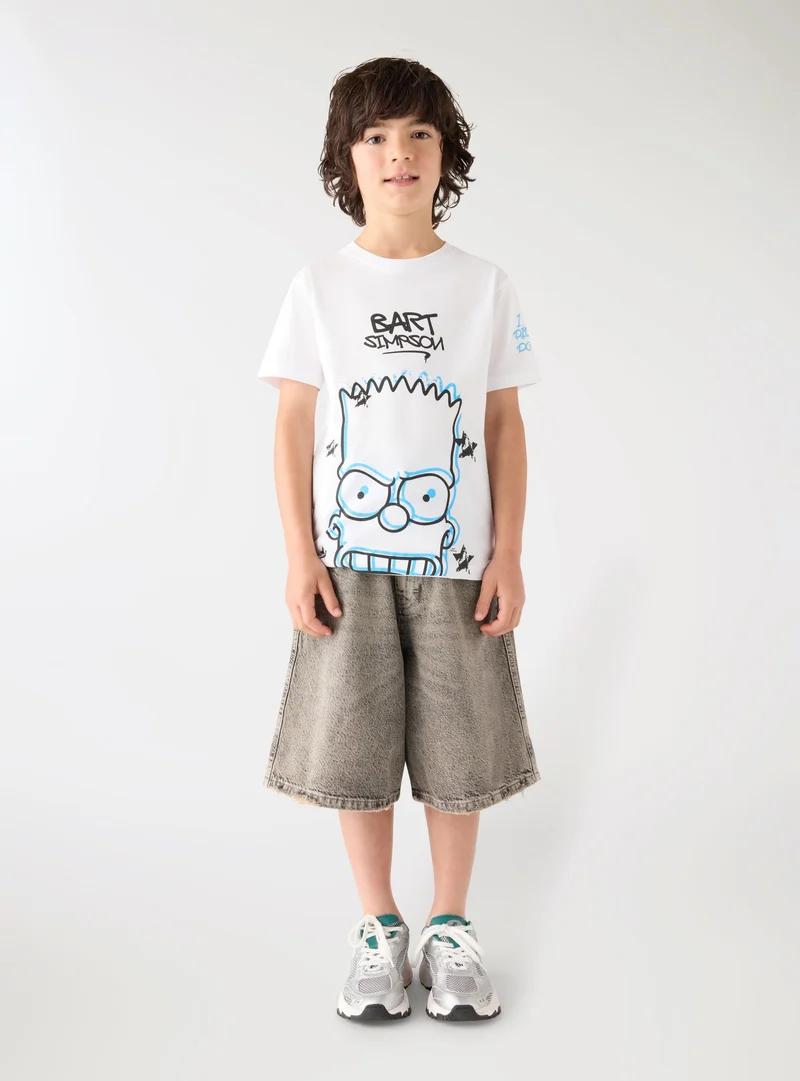 Pantaloncini jeans skater a tinta unita