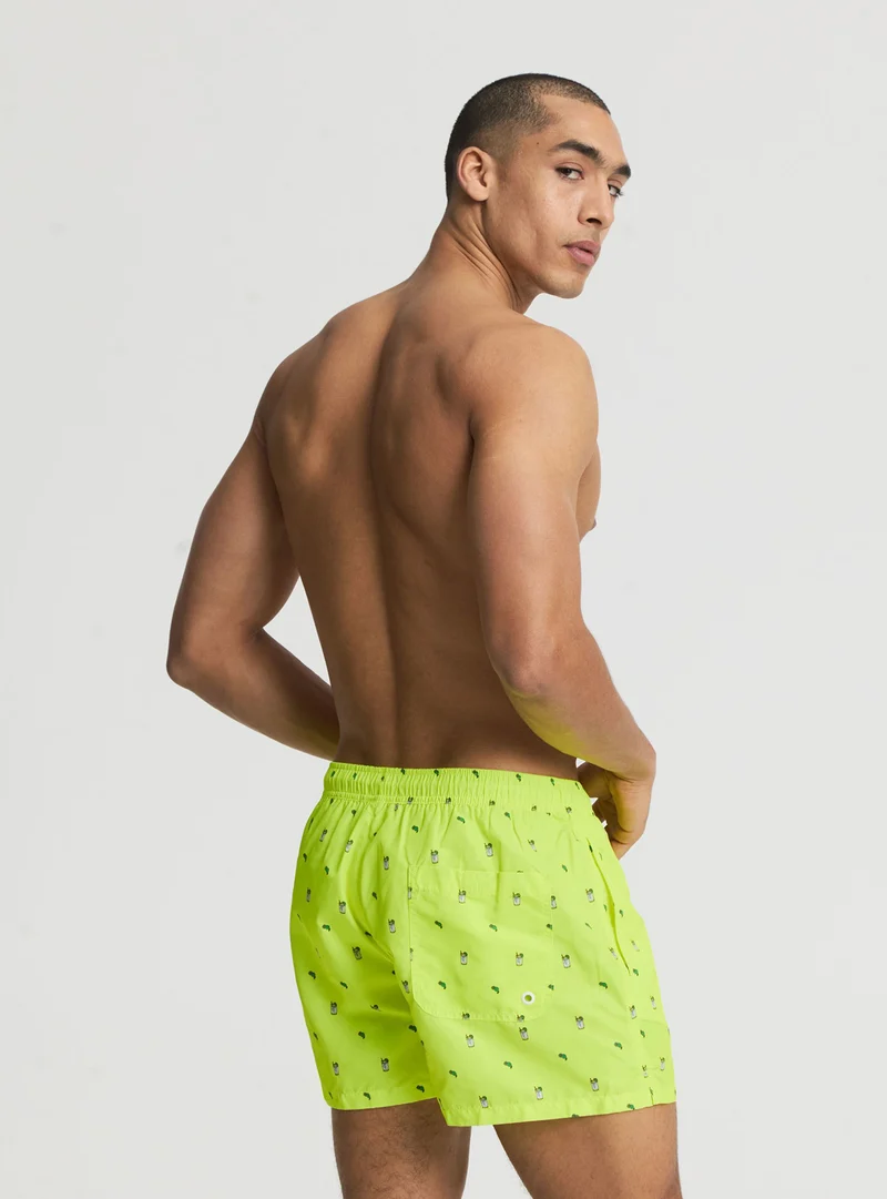 Pantaloncini mare con stampa all over e coulisse