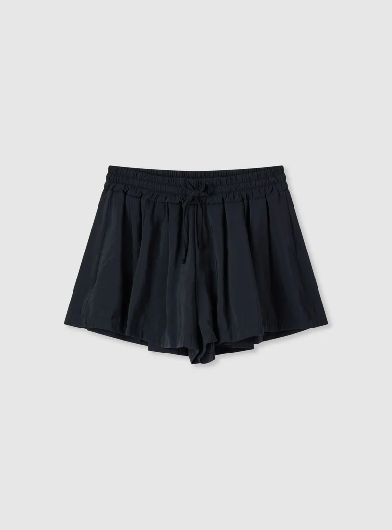 Shorts morbidi a tinta unita con coulisse
