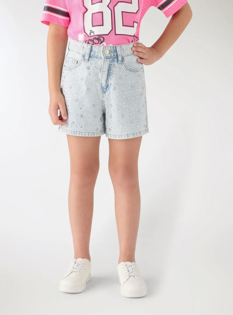 Shorts in denim con applicazioni