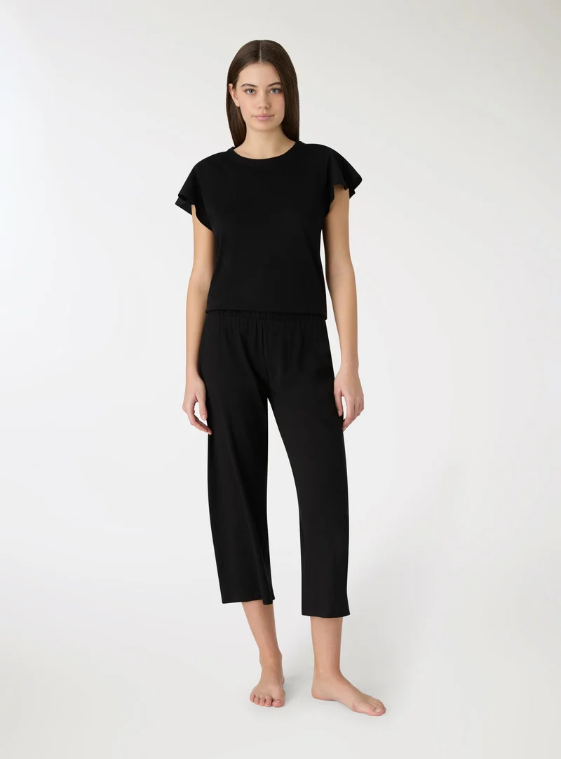 Set pigiama t-shirt e pantaloni capri