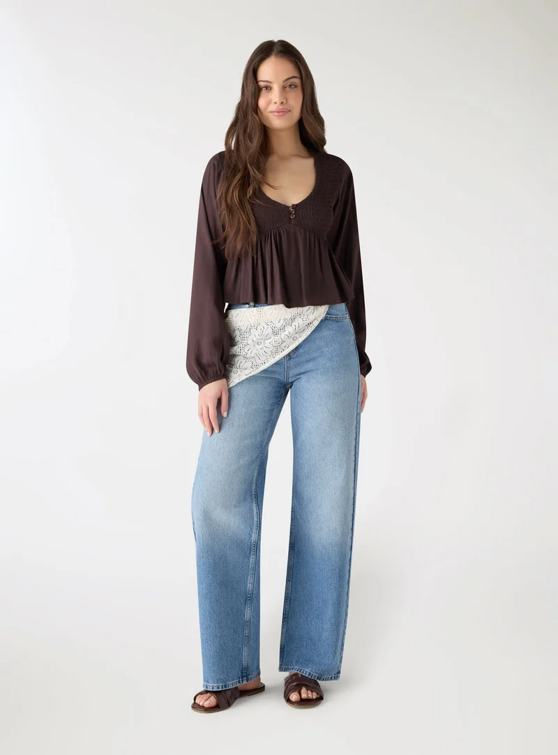 Jeans wide leg con bandana in pizzo