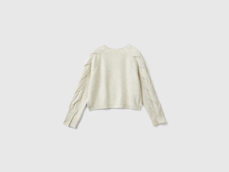 Maglia con paillettes e trecce