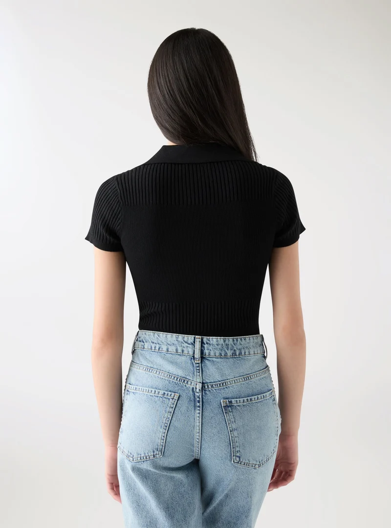 Body in maglia a tinta unita con colletto polo