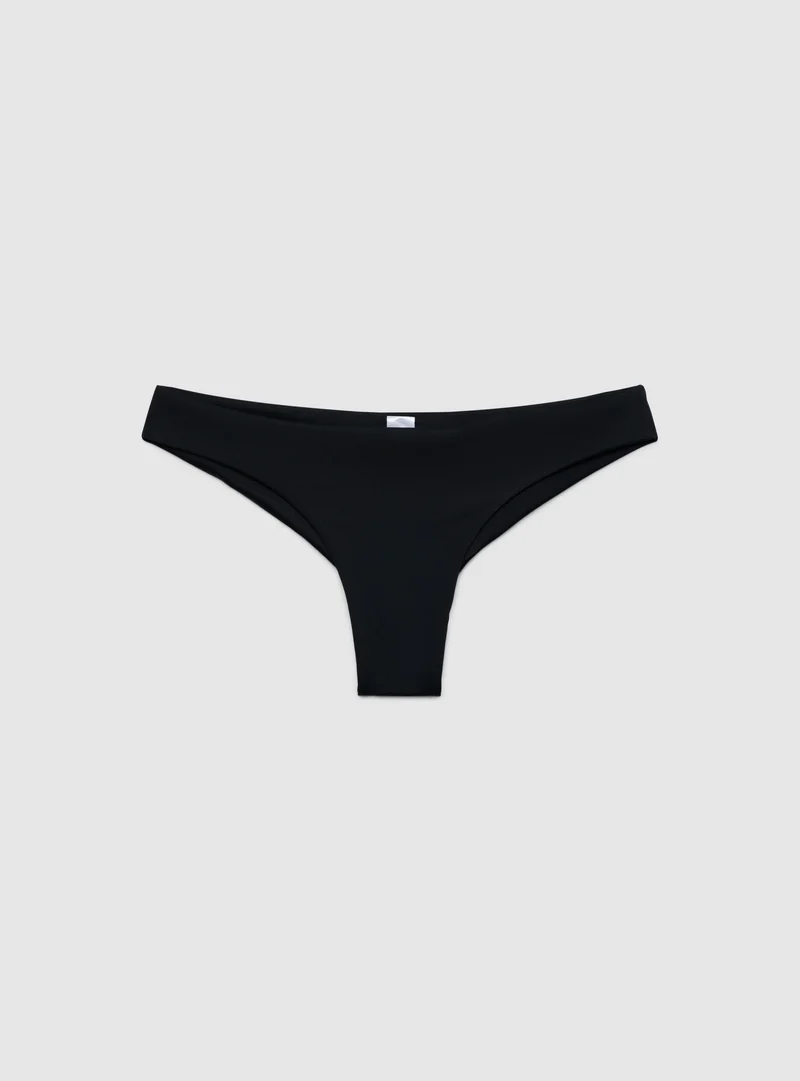 Slip bikini brasiliana a tinta unita