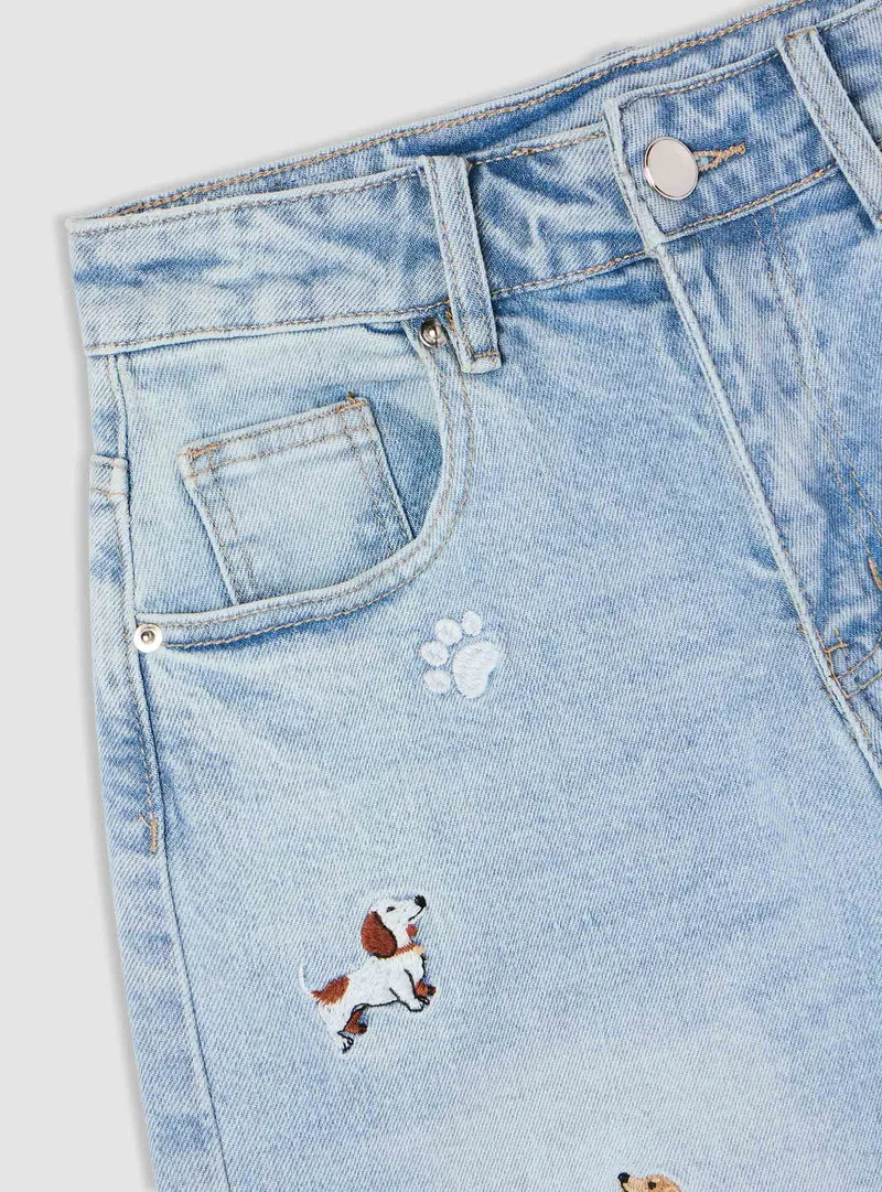 Shorts bermuda in denim con stampa e strappi
