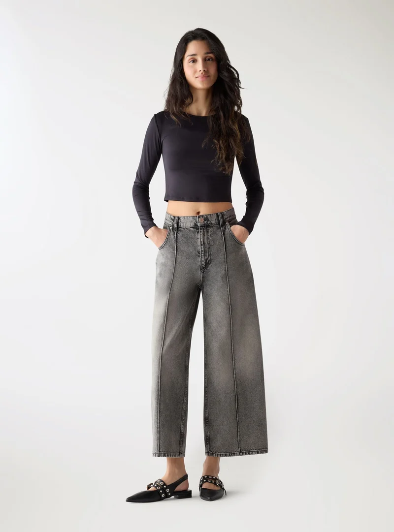 Jeans wide leg con nervatura