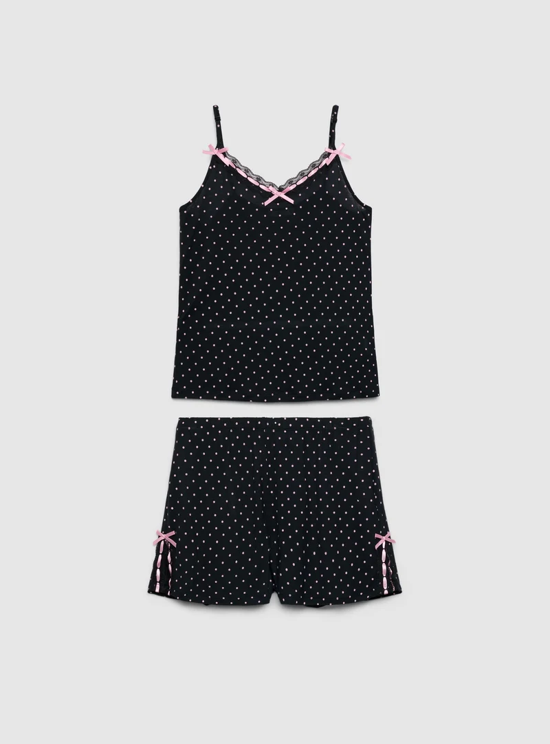 Set pigiama con top a spalline e shorts a pois