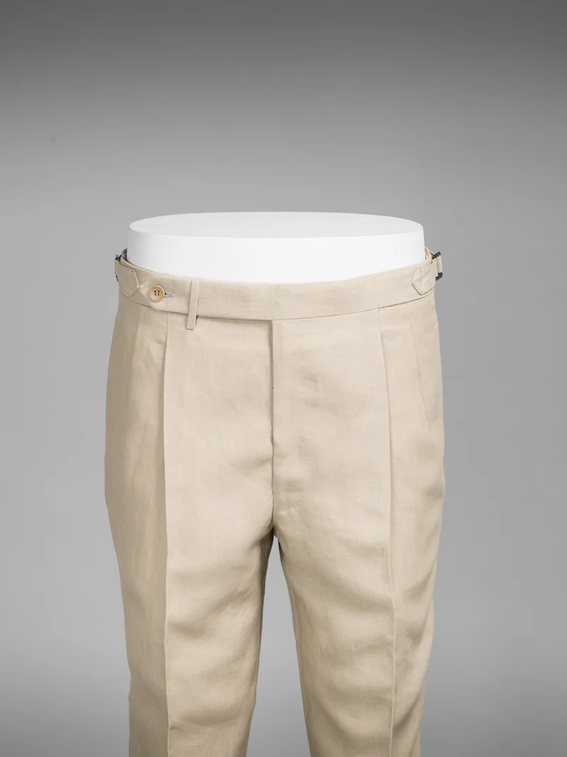 Beige pair of regular fit linen trousers