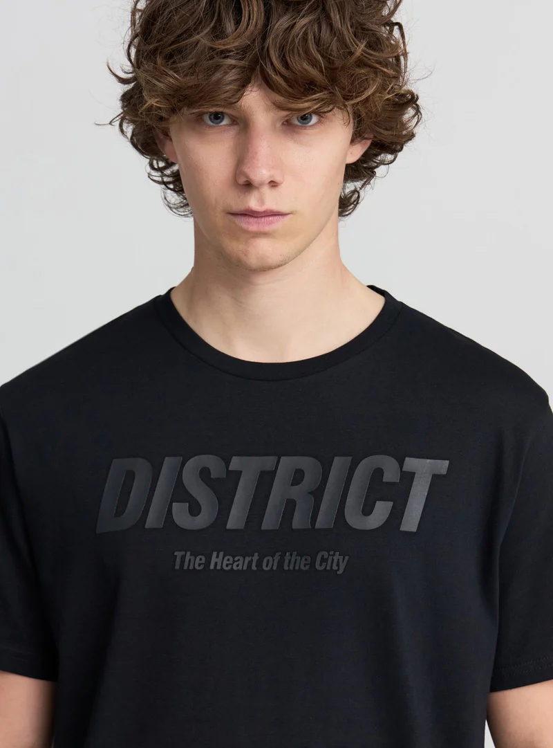 T-shirt con stampa scritta