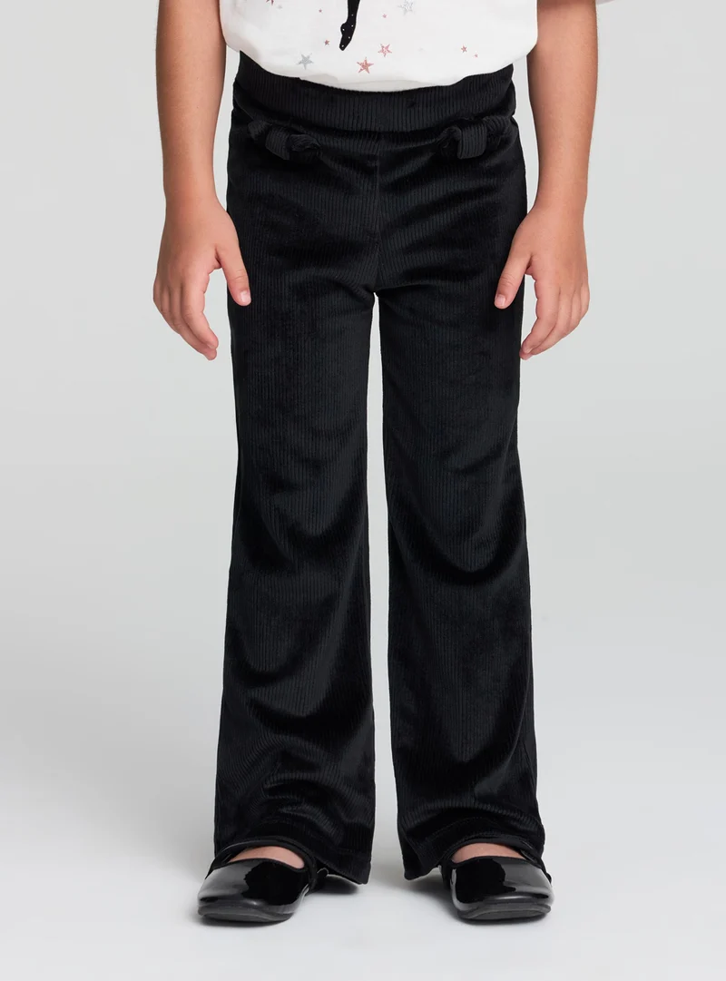 Leggings zampa a coste con fiocchi