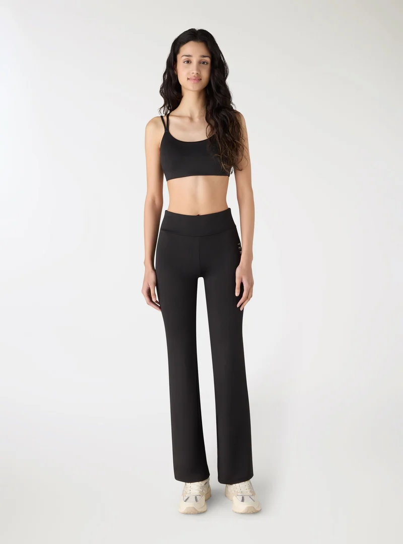Leggings a zampa con scritta