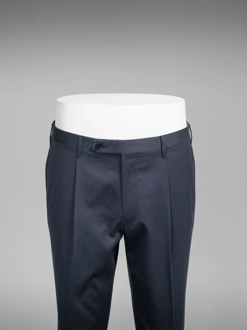 Dark blue pair of regular fit cotton trousers