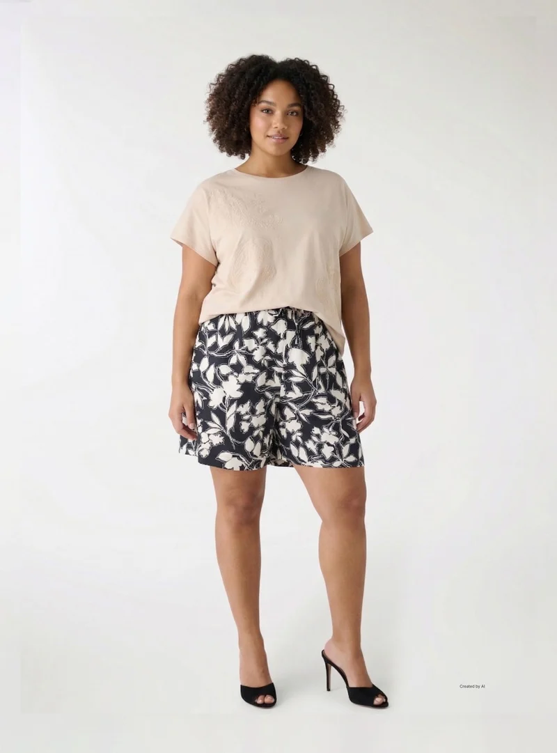 Shorts con stampa fiori e vita elastica