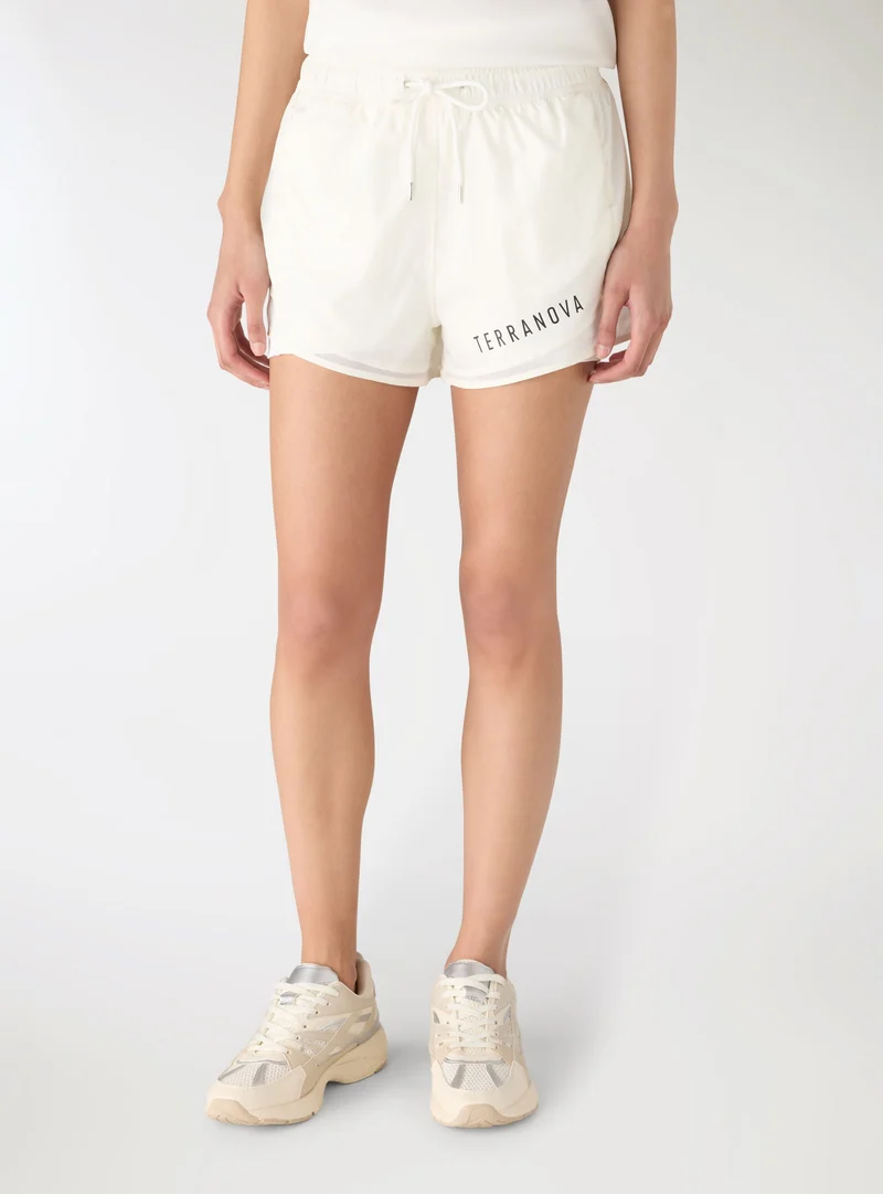 Shorts sportivi con inserto in tulle e scritta