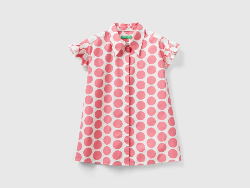 Camicia smanicata a pois