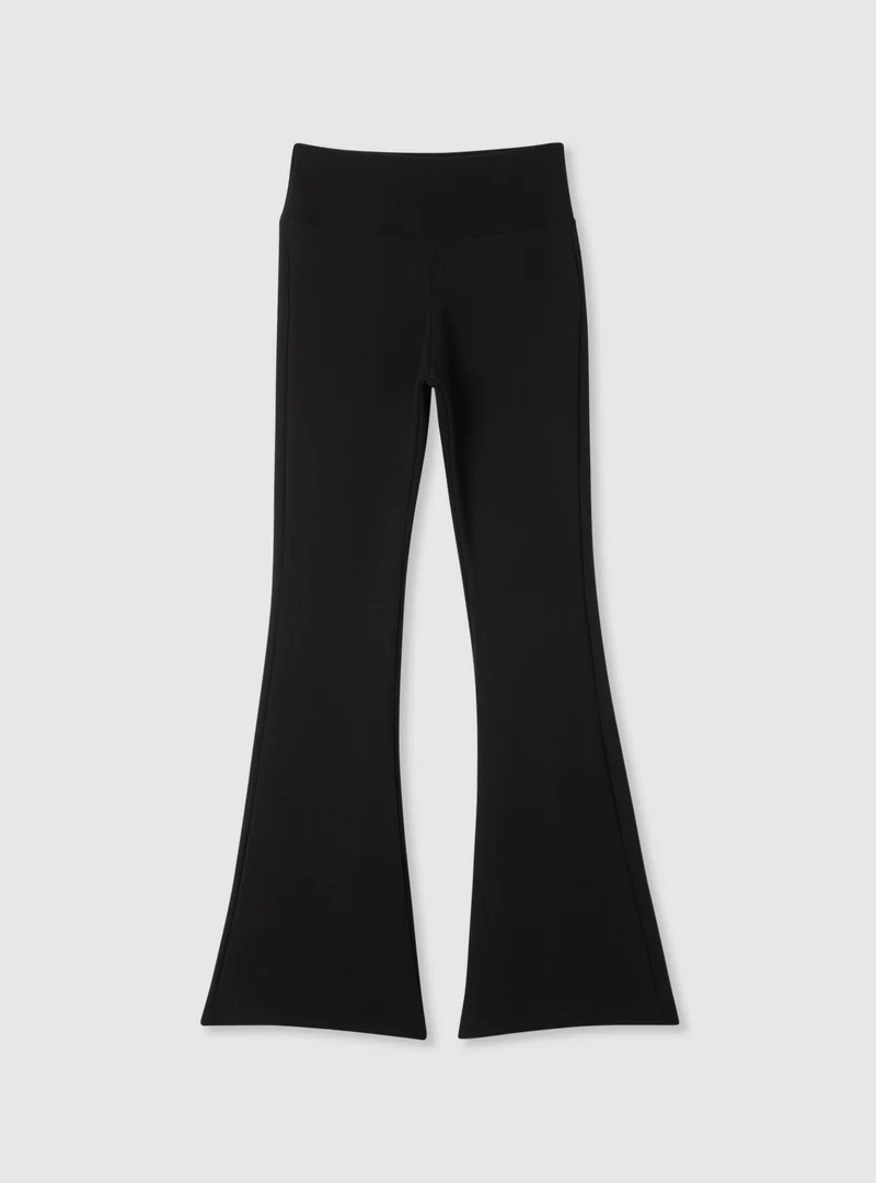 Leggings lunghi svasati a vita alta