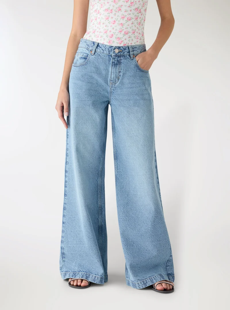 Jeans baggy a vita bassa tinta unita