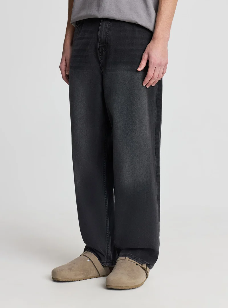 Jeans baggy a tinta unita