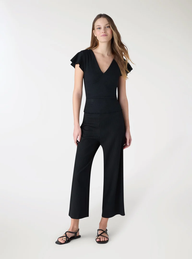 T-shirt volant con scollo a v