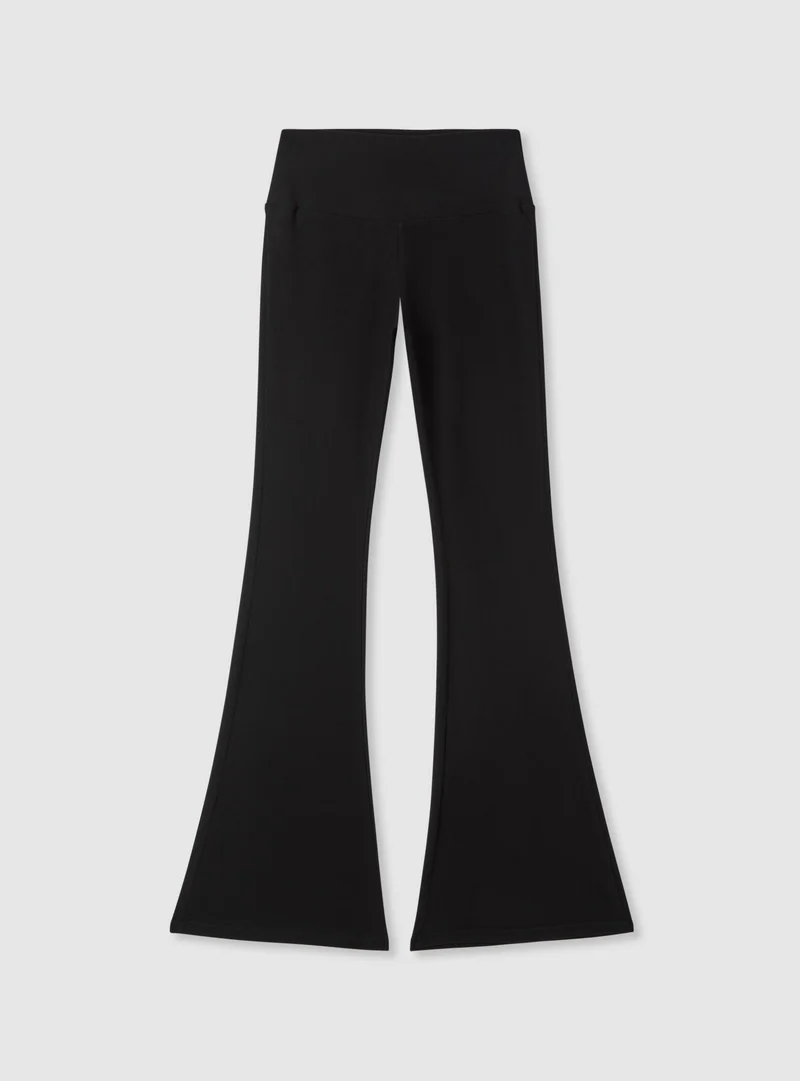 Leggings lunghi a tinta unita svasati