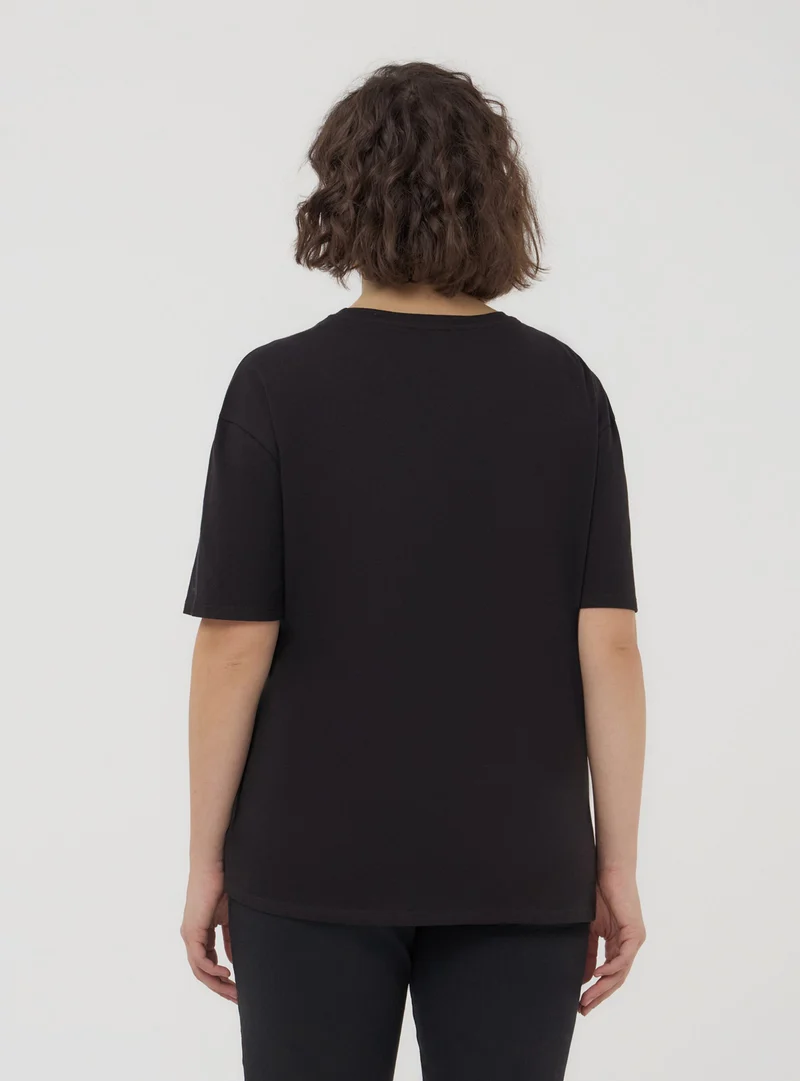 T-shirt tinta unita con strass