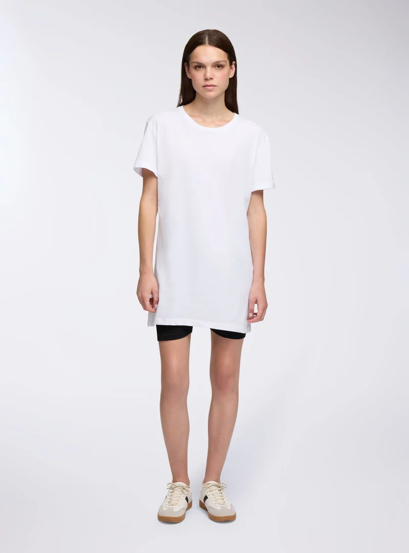 T-shirt maxi over a tinta unita