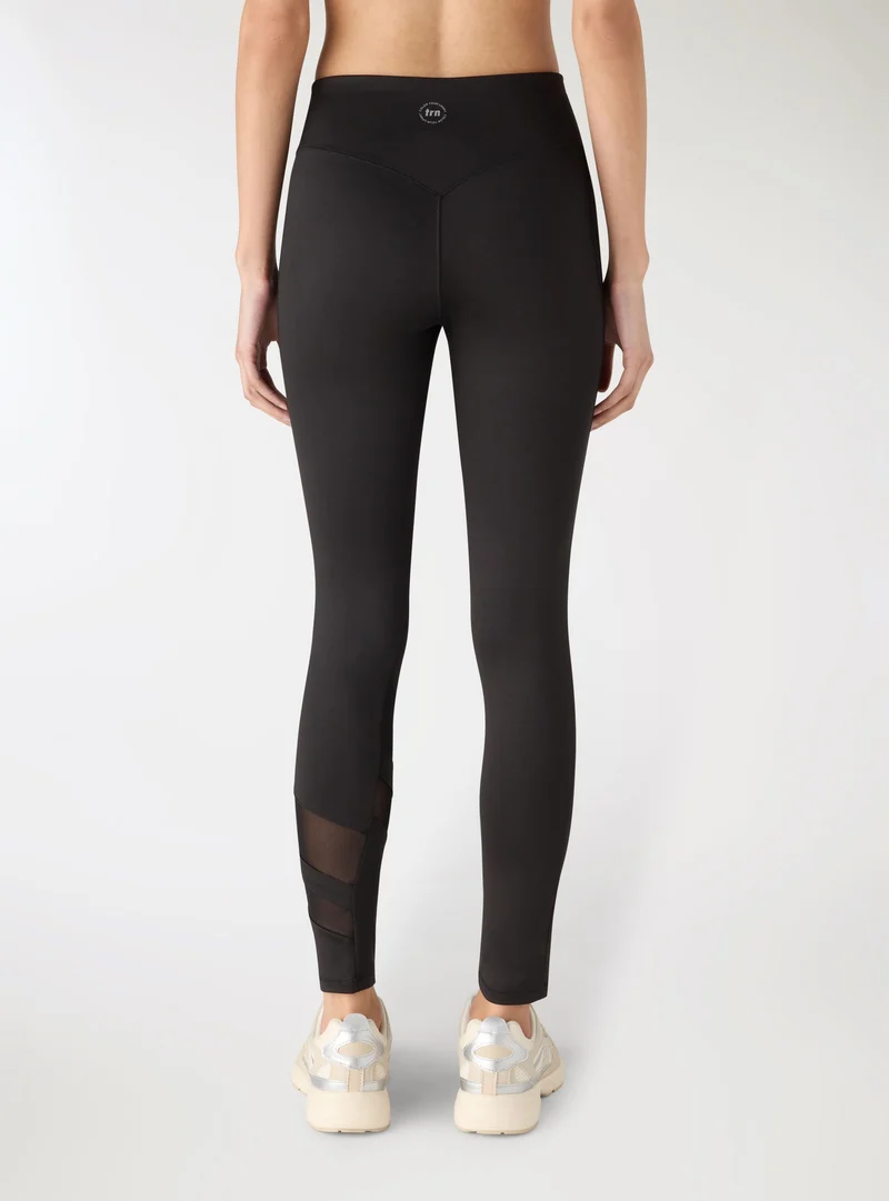 Leggings lunghi con inserto tulle e scritta