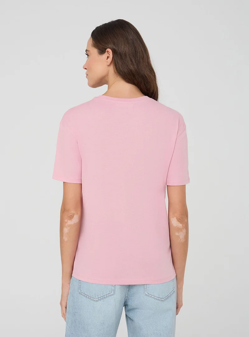 T-shirt ampia con scritta "Dolce far niente"