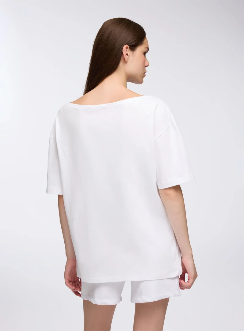 T-shirt spalle scoperte con numero